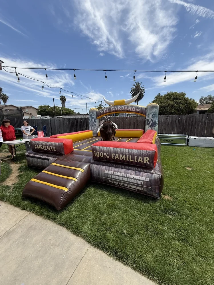 A party setup with guests gathered outside